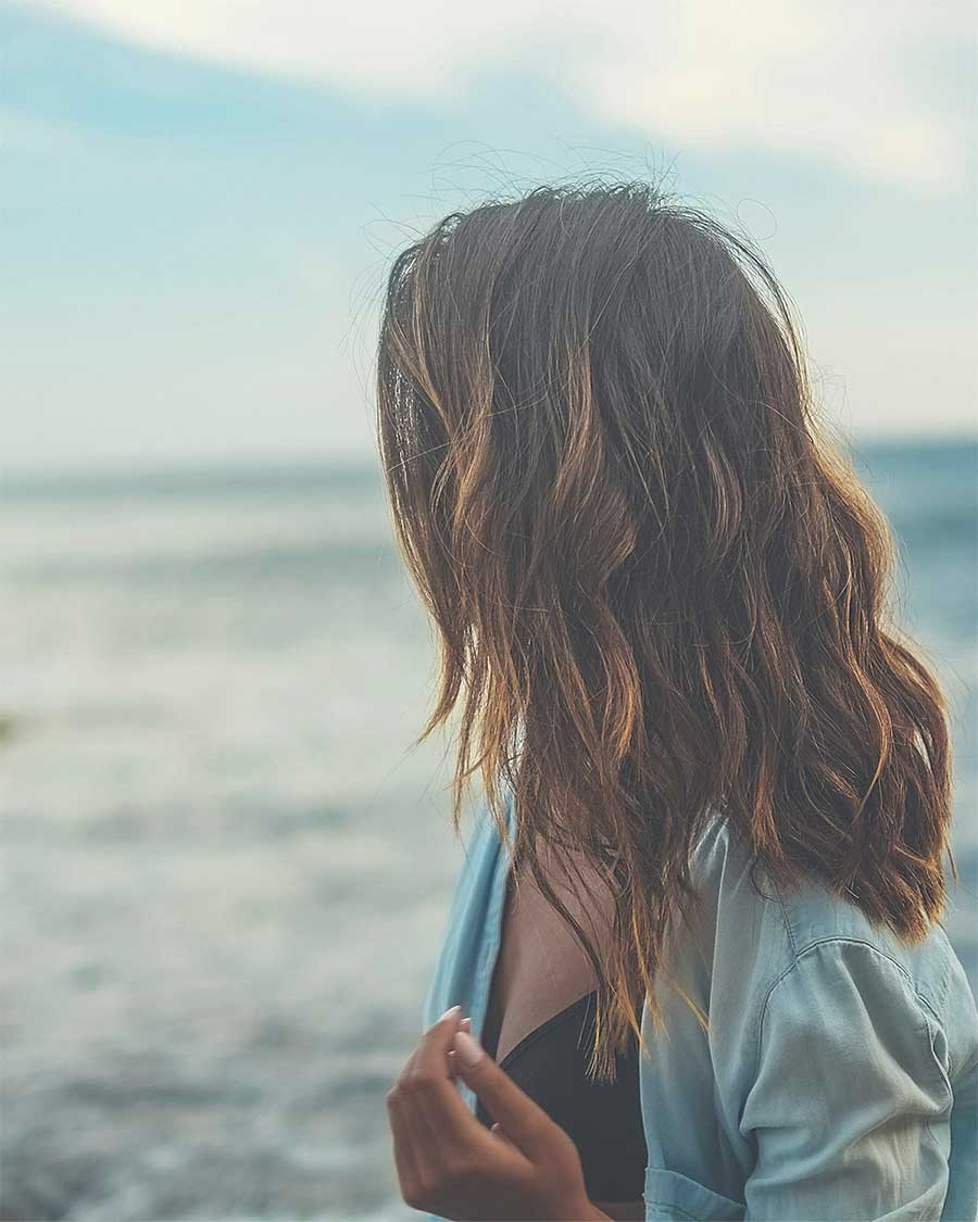 woman gazing at the ocean 